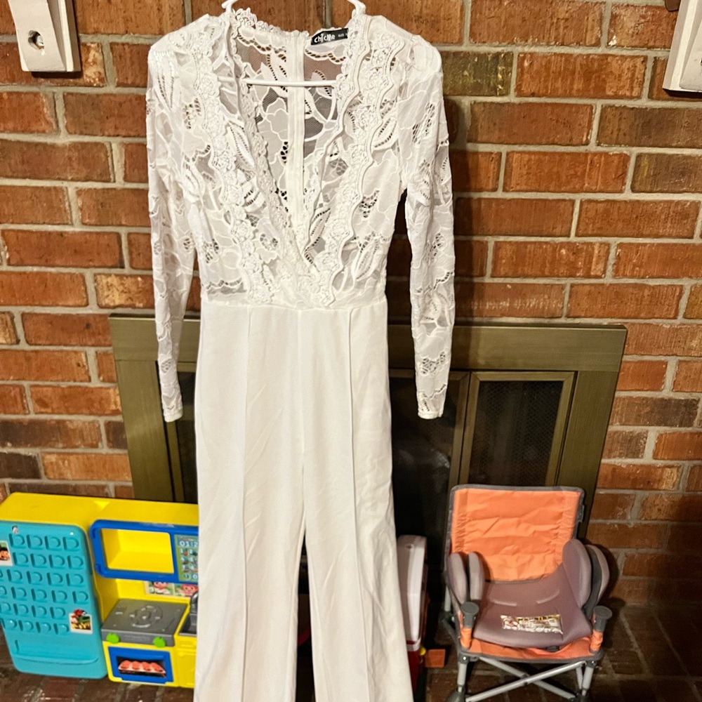 Chic me size S. White one piece outfit.
